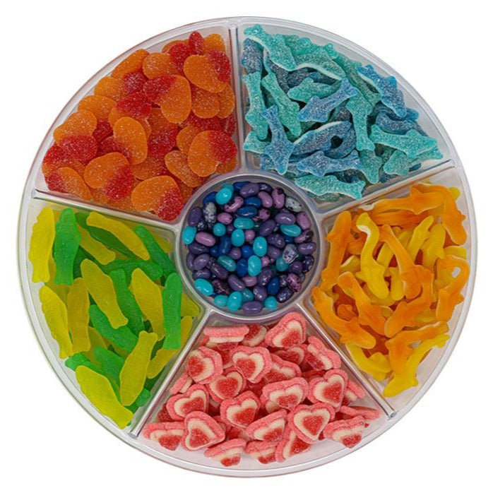 candy platter with Red and Orange Peach Hearts, Orange & Yellow Gummy Sand Sharks, Yellow & Green Swedish Fish, Blue Sour Sharks, Blue & Purple Jelly Bellies & Pink & Red Triple Layer Hearts