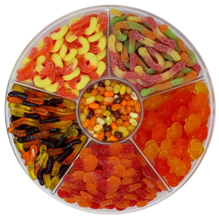 candy platter with Gummy Pumpkins, Sour Peach Rings, Sour Peach Hearts, Flavorful Jelly Bellies, Gummy Worms & Sour Worms.