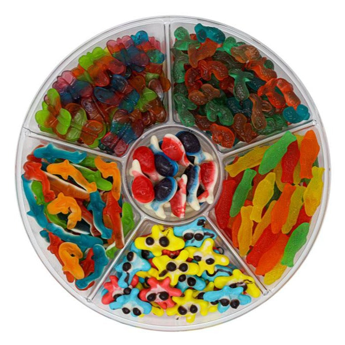 candy platter with Swedish Fish, Sand Sharks, Colorful Butterflies, Gummy Mermaid Tails, Gummy Whales and Gummy Blobs and more